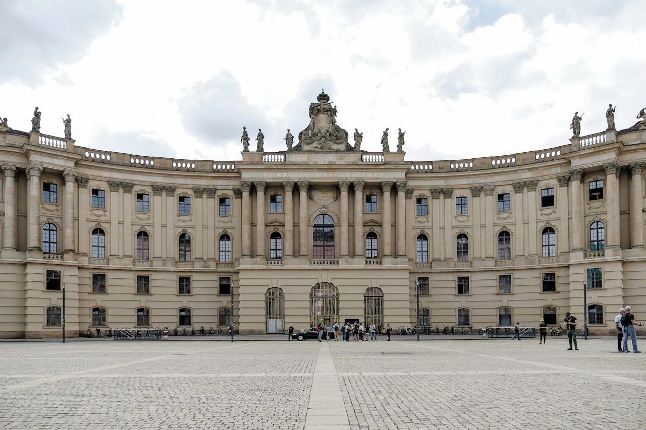 Elegant facade of Humboldt Universitys library in Berlin, showcasing neoclassical architecture.
